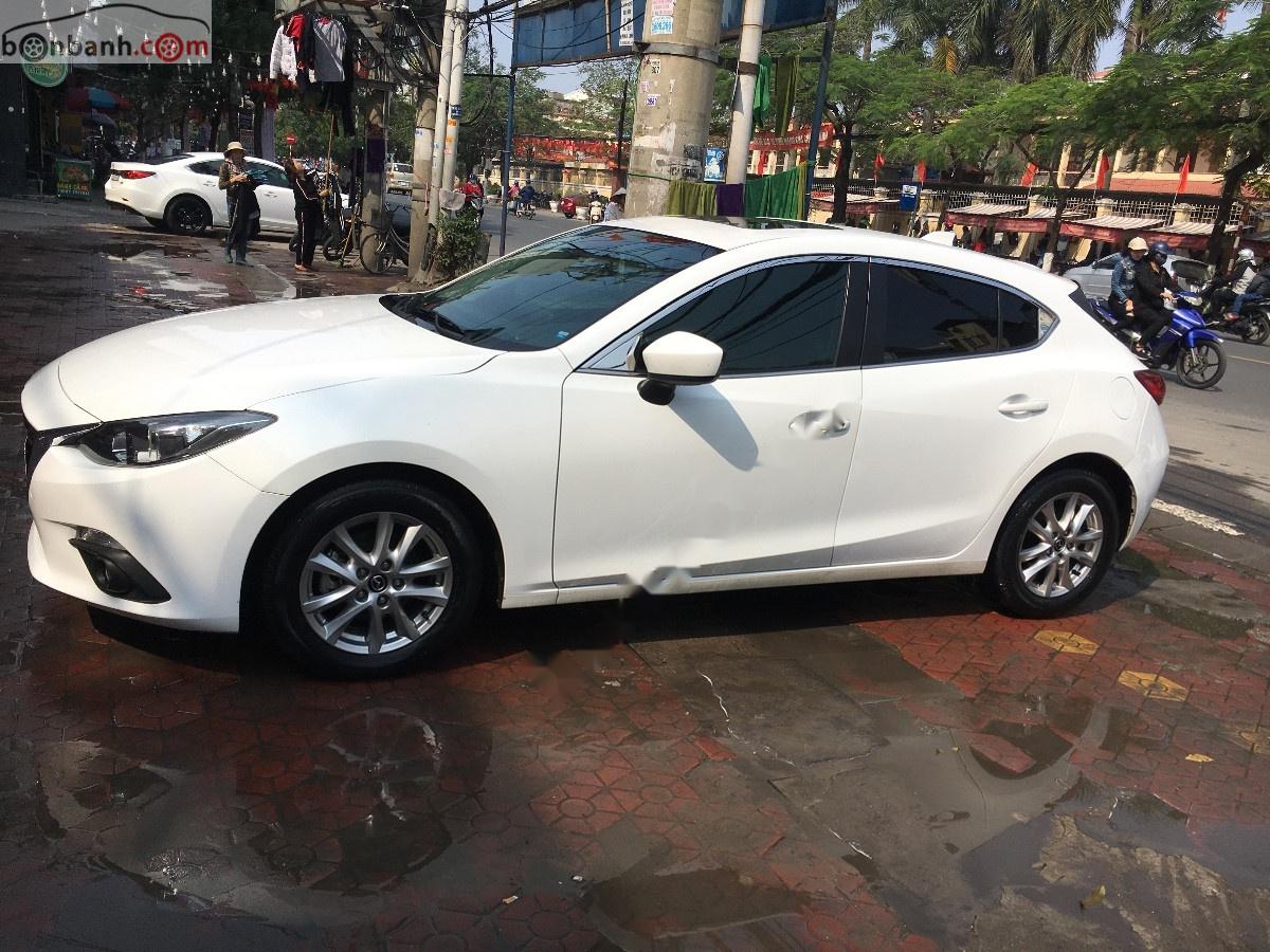 Mazda 3 1.5 AT 2016 - Cần bán Mazda 3 1.5 AT đời 2016, màu trắng đã đi 29000 km