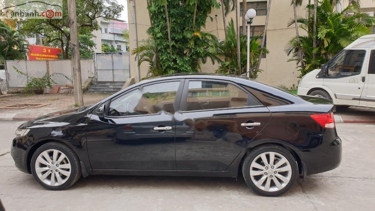 Kia Cerato 2011 - Cần bán lại xe Kia Cerato 1.6 AT đời 2011, màu đen, xe nhập