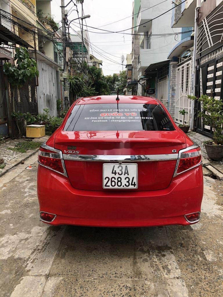 Toyota Vios 2015 - Cần bán lại xe Toyota Vios AT sản xuất 2015, màu đỏ chính chủ