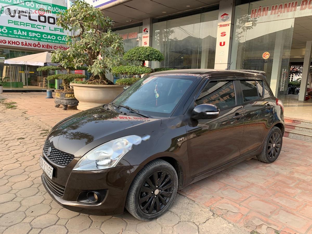 Suzuki Swift 2014 - Cần bán Suzuki Swift 1.4 AT đời 2014, màu nâu, chính chủ