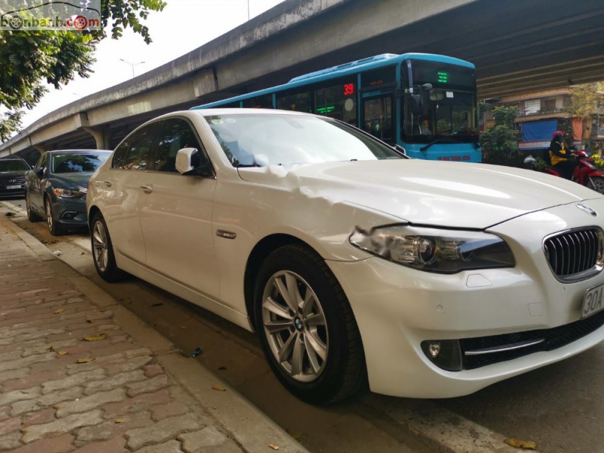 BMW 5 Series   2012 - Cần bán xe BMW 520i đời 2012, màu trắng, xe nhập, giá tốt