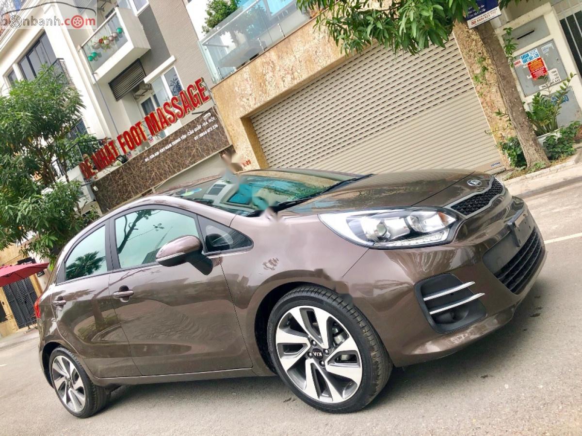 Kia Rio   2015 - Cần bán lại xe Kia Rio 1.4 AT đời 2015, màu nâu, xe nhập