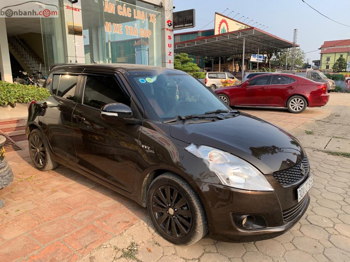 Suzuki Swift 2014 - Cần bán Suzuki Swift 1.4 AT đời 2014, màu nâu, chính chủ