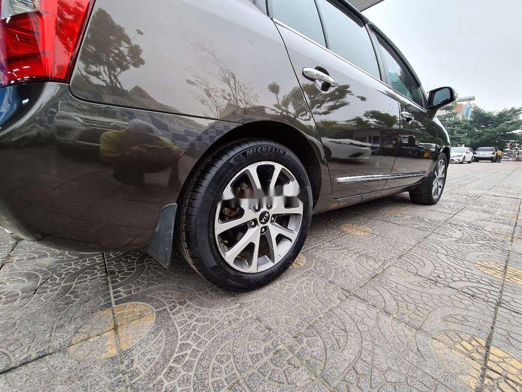 Kia Carens   2014 - Cần bán Kia Carens sản xuất 2014, màu nâu chính chủ