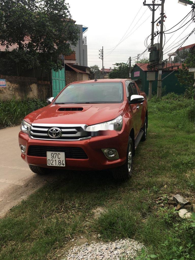 Toyota Hilux 2015 - Cần bán xe Toyota Hilux 3.0GAT đời 2015, màu đỏ, nhập khẩu, giá chỉ 605 triệu