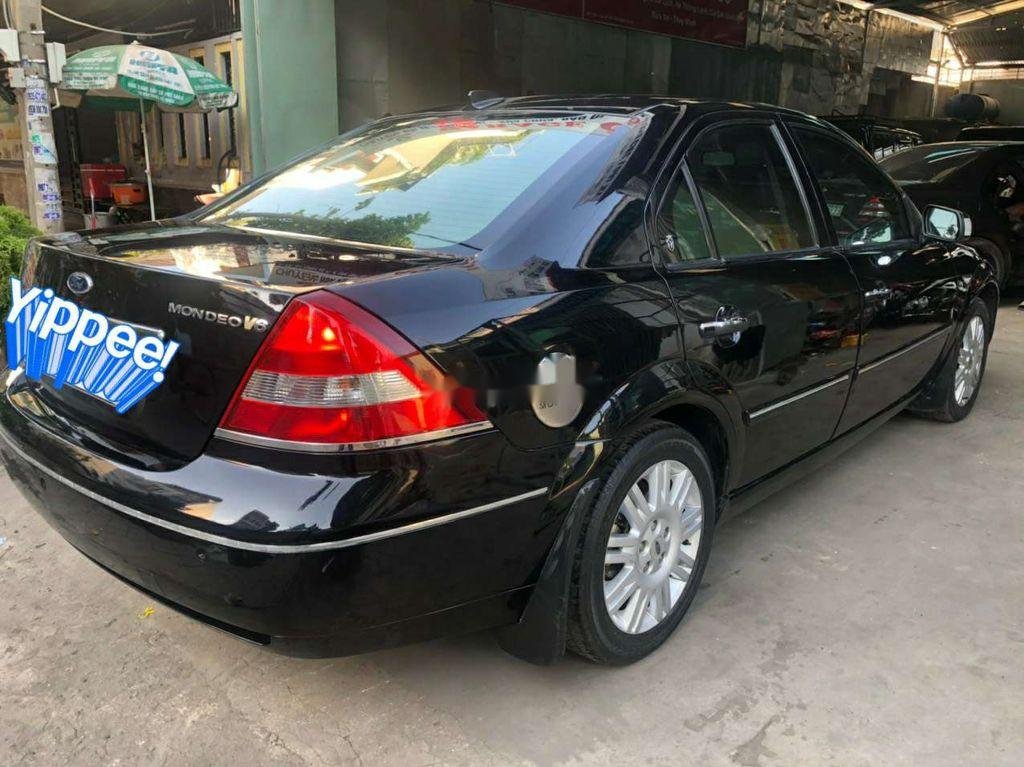 Ford Mondeo 2004 - Cần bán xe Ford Mondeo AT sản xuất 2004, màu đen