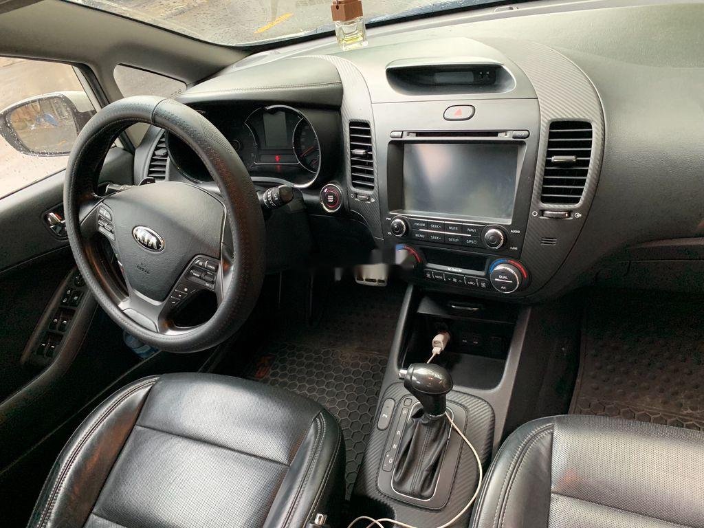 Kia K3    2014 - Cần bán gấp Kia K3 sản xuất 2014 như mới