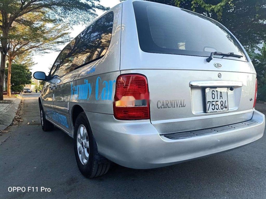 Kia Carnival   2007 - Cần bán Kia Carnival đời 2007, màu bạc, xe nhập, 219 triệu