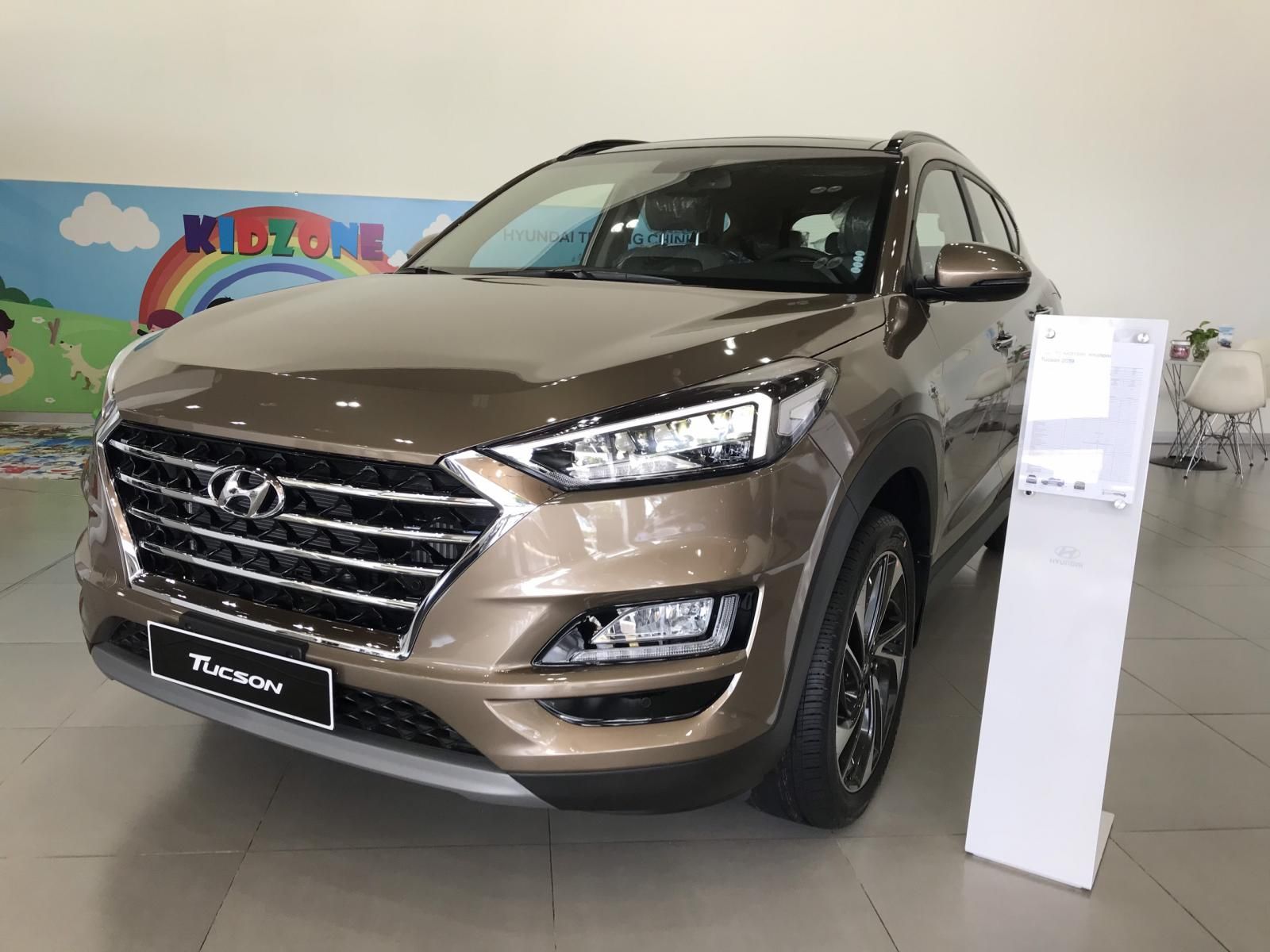 Hyundai Tucson   2019 - Bán xe Hyundai Tucson 1.6 Turbo đời 2019, màu nâu vàng giá cạnh tranh