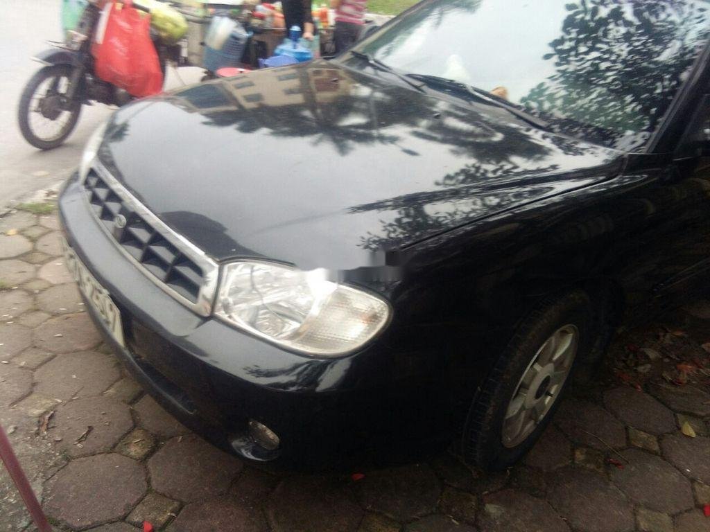 Kia Spectra 2005 - Cần bán gấp Kia Spectra năm 2005, màu đen