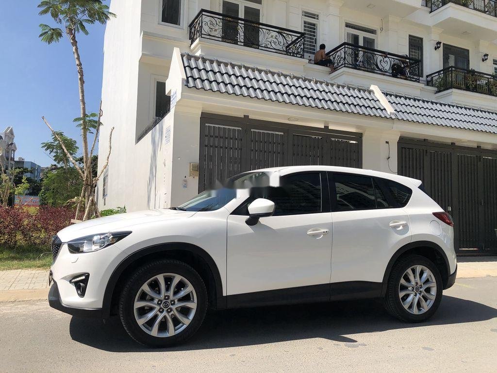 Mazda CX 5  AT   2015 - Bán xe Mazda CX 5 AT đời 2015, màu trắng xe gia đình