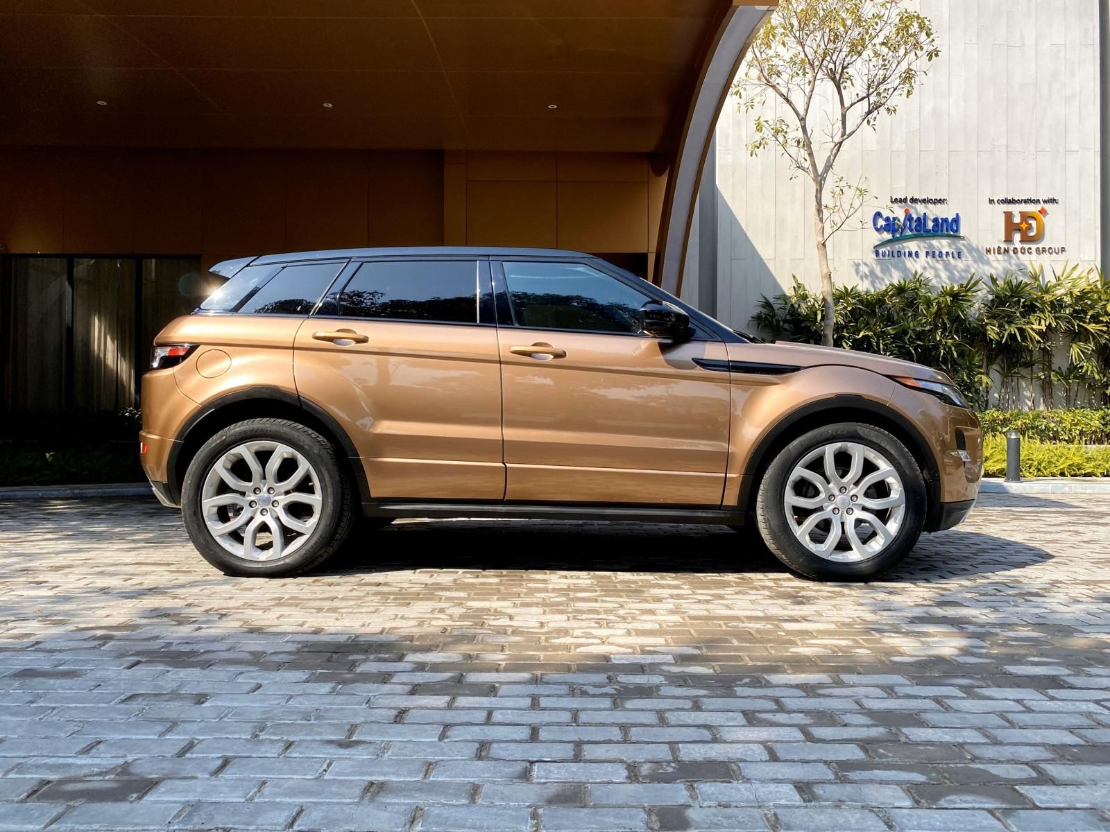 LandRover Evoque Dynamic 2014 - Bán ô tô LandRover Evoque Dynamic sản xuất năm 2014, màu vàng đồng, xe nhập