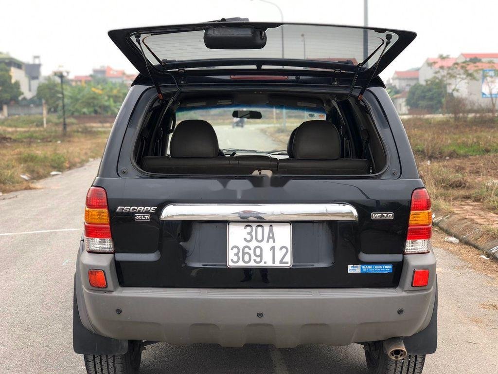 Ford Escape   2002 - Cần bán gấp Ford Escape đời 2002, màu đen