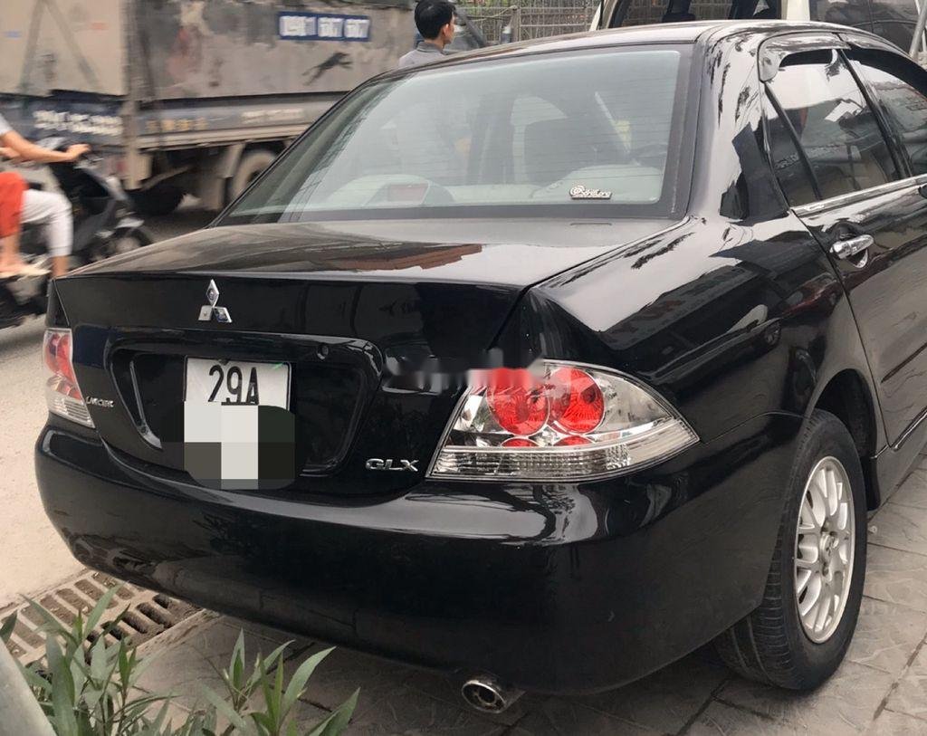 Mitsubishi Lancer     2004 - Cần bán Mitsubishi Lancer năm sản xuất 2004, nhập khẩu số tự động