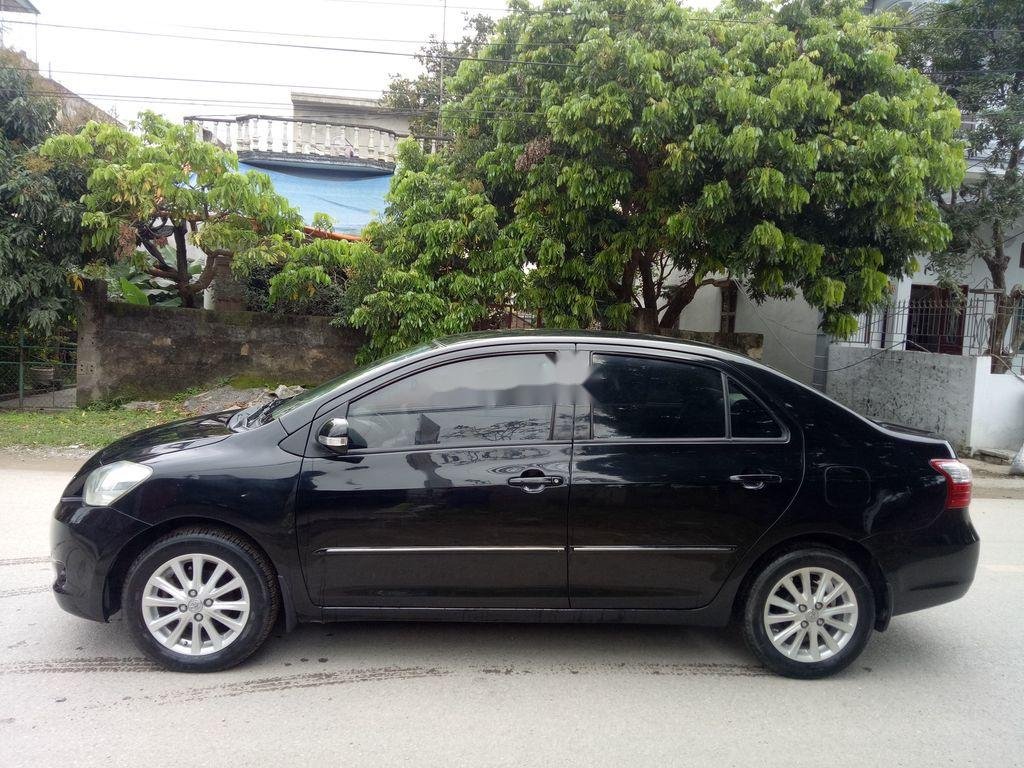 Toyota Vios 2010 - Bán ô tô Toyota Vios đời 2010, màu đen số sàn