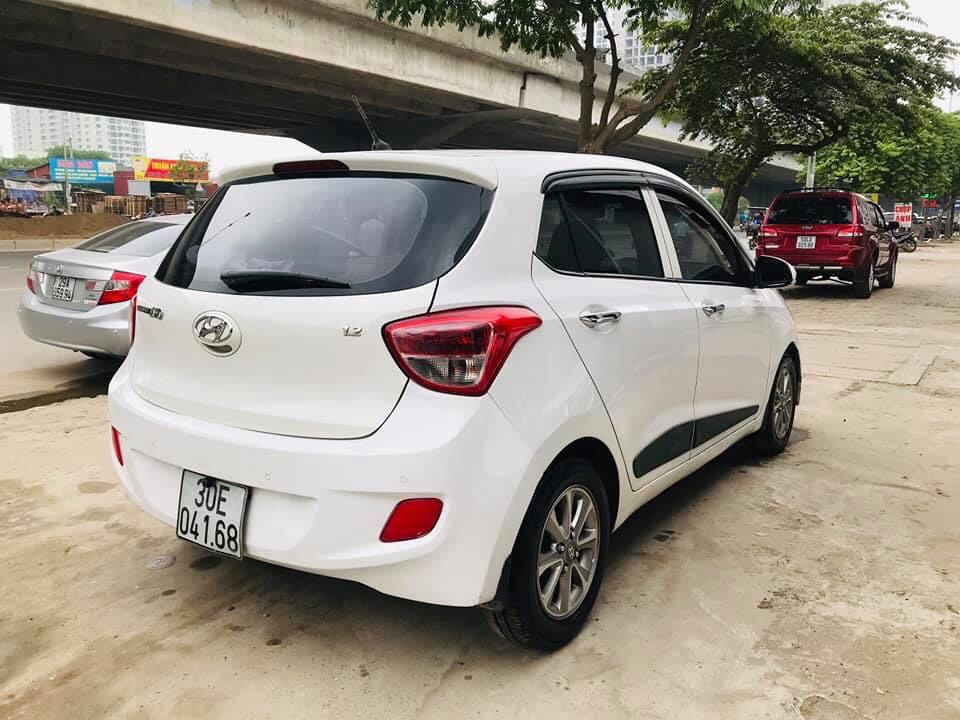 Hyundai Grand i10 2016 - Bán Hyundai i10 2016, màu trắng, xe gia đình đẹp giá tốt.