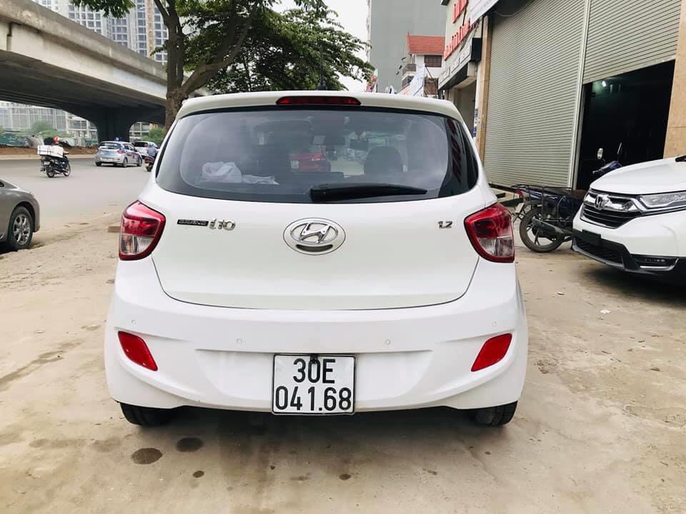 Hyundai Grand i10 2016 - Bán Hyundai i10 2016, màu trắng, xe gia đình đẹp giá tốt.