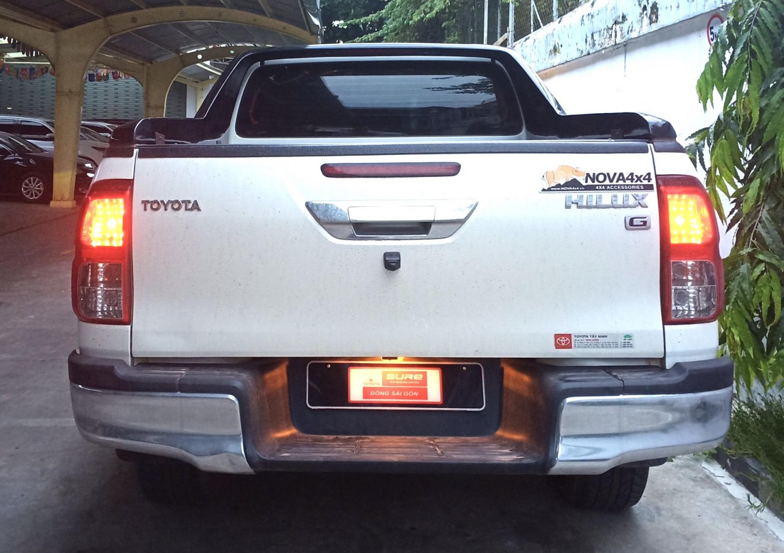 Toyota Hilux 2.8G AT 4x4 2016 - Cần bán lại xe Toyota Hilux 2.8G AT 4x4 đời 2016, màu trắng, nhập khẩu nguyên chiếc