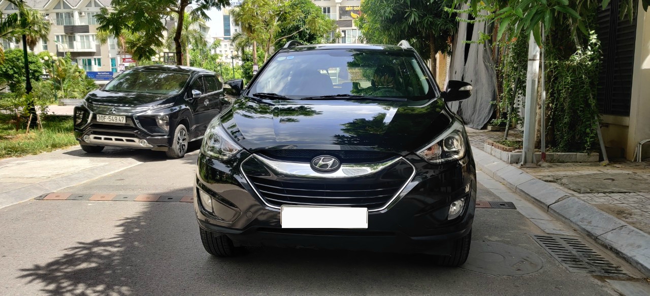 Hyundai Tucson 2.0 AT 2014 - Bán xe Hyundai Tucson 2.0 AT 2014, màu đen, xe nhập