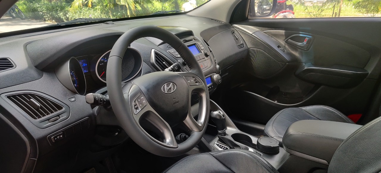 Hyundai Tucson 2.0 AT 2014 - Bán xe Hyundai Tucson 2.0 AT 2014, màu đen, xe nhập