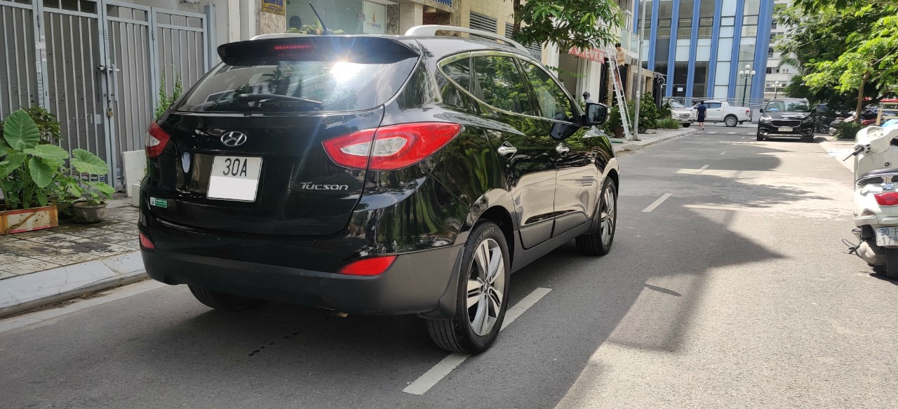 Hyundai Tucson 2.0 AT 2014 - Bán xe Hyundai Tucson 2.0 AT 2014, màu đen, xe nhập