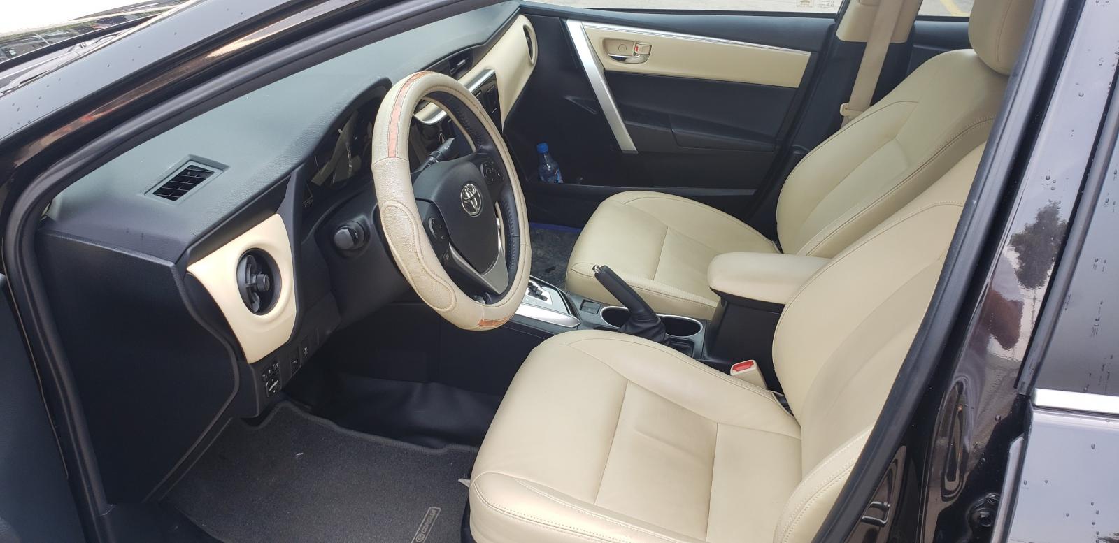 Toyota Corolla altis G 2018 - Cần bán gấp Toyota Corolla altis G sản xuất 2018,lướt 21.000km  màu nâu, giá 720tr