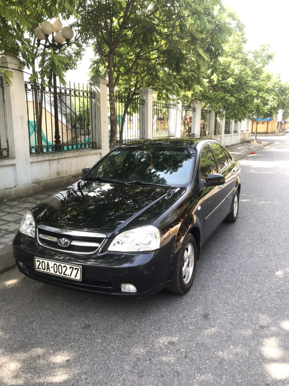 Daewoo Lacetti 2010 - Cần bán xe Daewoo Lacetti đời 2010, màu đen, xe gia đình sử dụng ít 