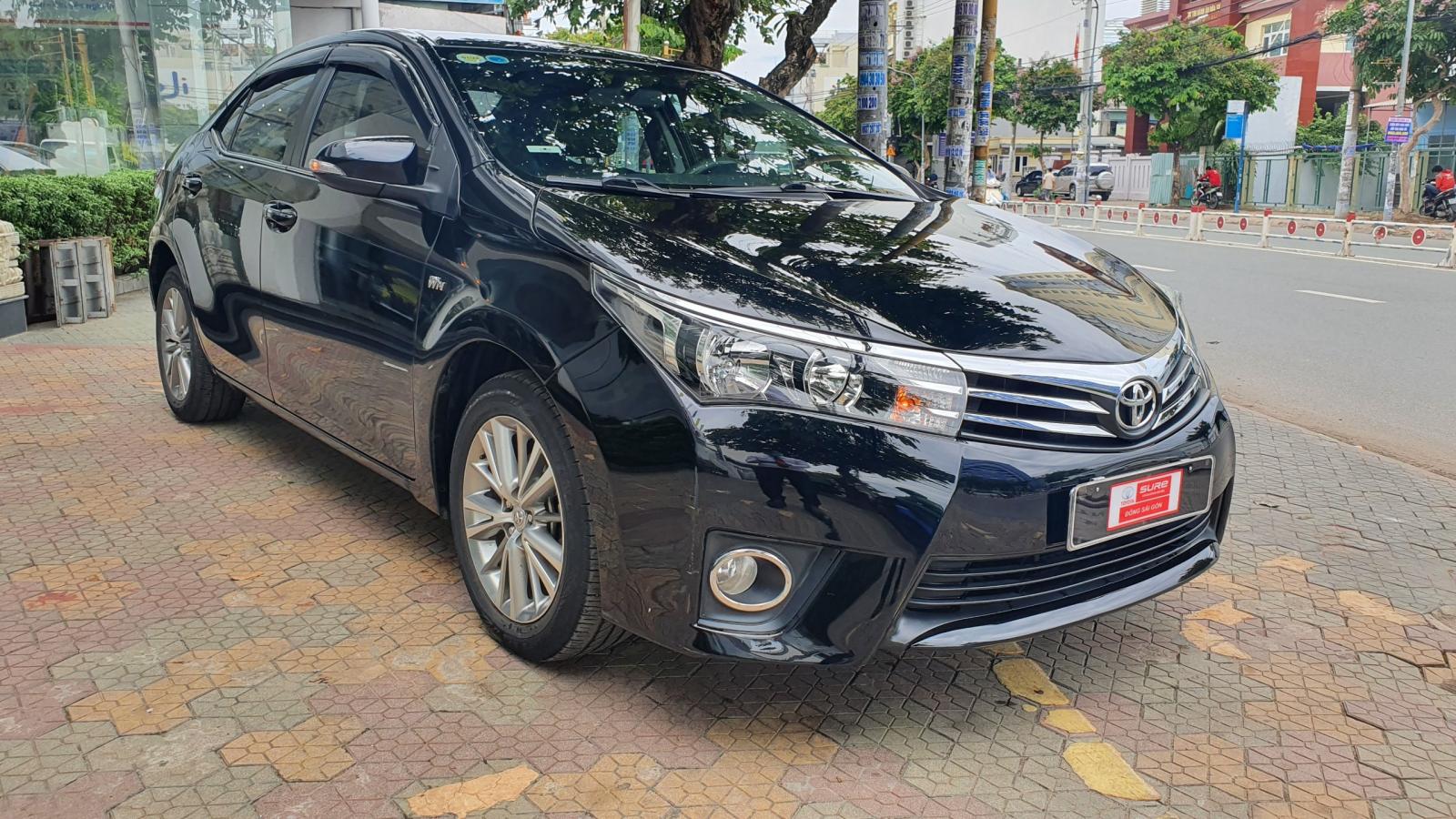 Toyota Corolla altis 1.8G 2015 - Bán ô tô Toyota Corolla altis 1.8G năm 2015, màu đen, giá chỉ 610 triệu