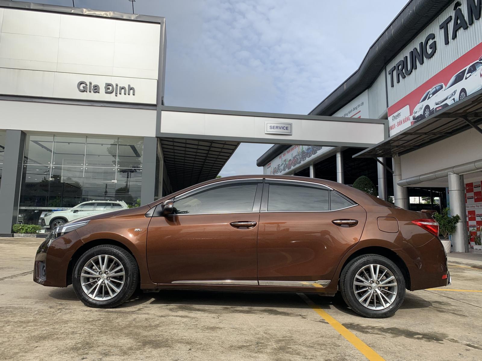 Toyota Corolla altis 1.8G 2014 - Xe Toyota Corolla altis 1.8G đời 2014, màu nâu, 590 triệu