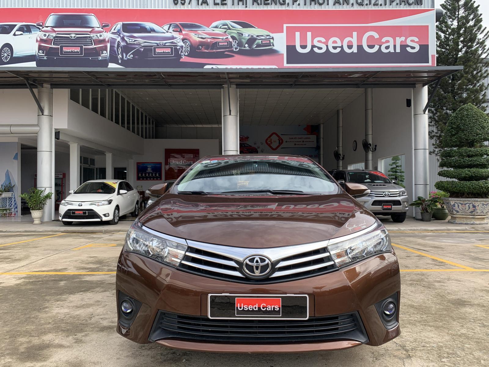 Toyota Corolla altis 1.8G 2014 - Xe Toyota Corolla altis 1.8G đời 2014, màu nâu, 590 triệu