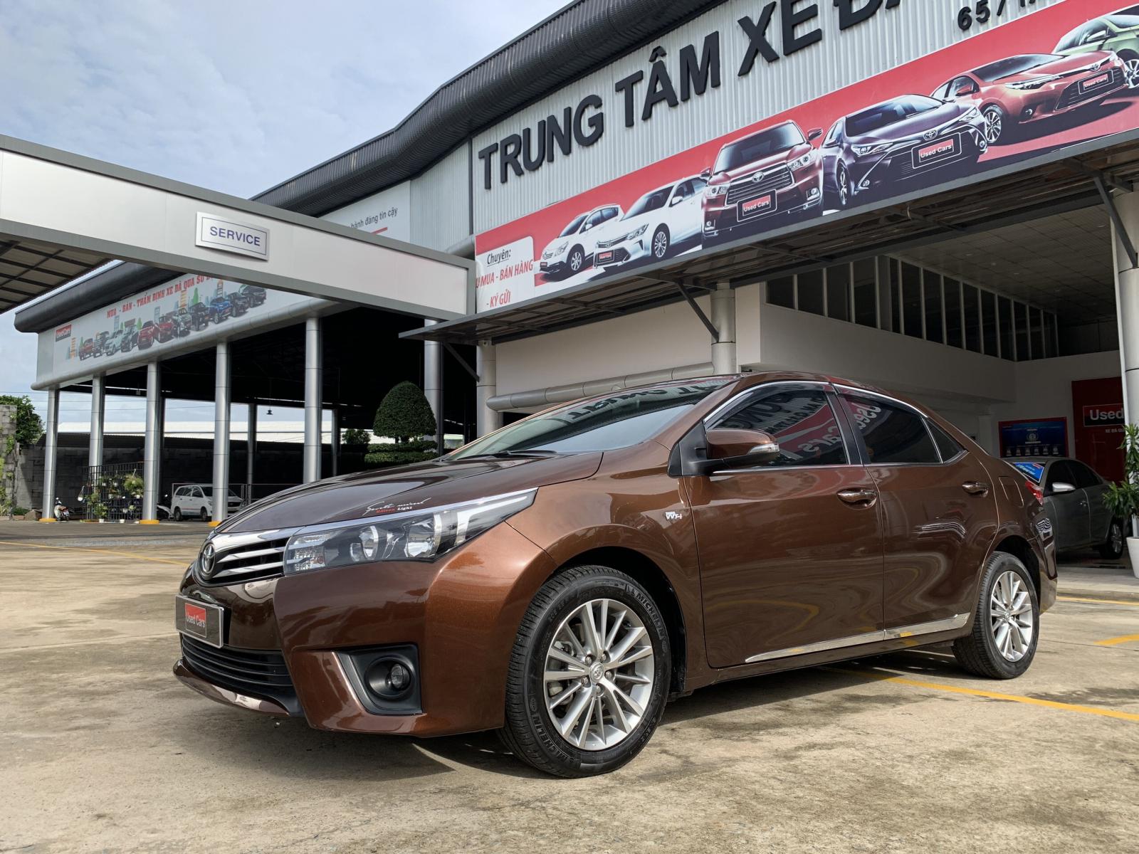 Toyota Corolla altis 1.8G 2014 - Bán Toyota Corolla altis 1.8G đời 2014, màu nâu, giá tốt