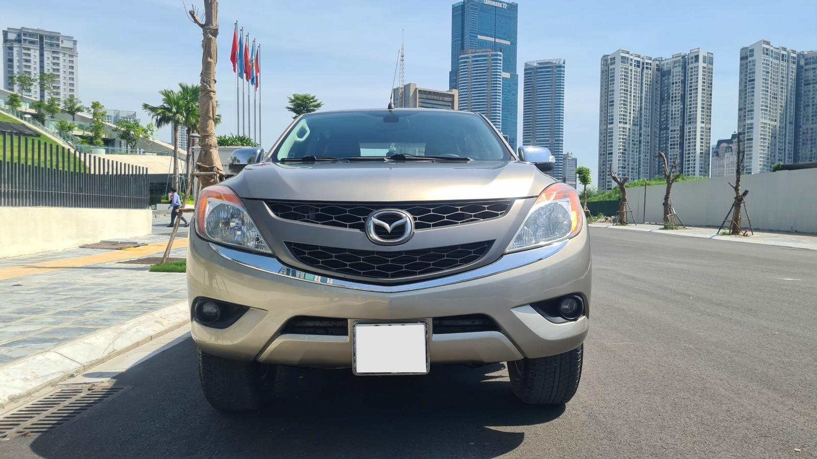 Mazda BT 50 2.2L 4x2 AT 2015 - Xe Mazda BT 50 2.2L 4x2 AT đời 2015, màu vàng, nhập khẩu