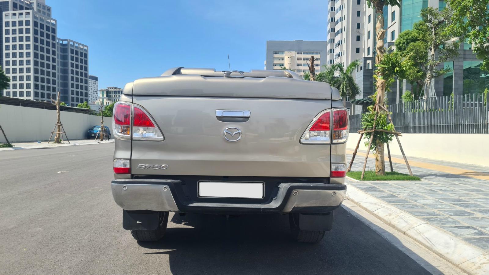 Mazda BT 50 2.2L 4x2 AT 2015 - Xe Mazda BT 50 2.2L 4x2 AT đời 2015, màu vàng, nhập khẩu