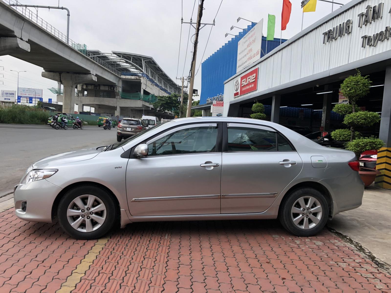 Toyota Corolla altis 1.8G 2009 - Bán ô tô Toyota Corolla altis 1.8G đời 2009, màu bạc