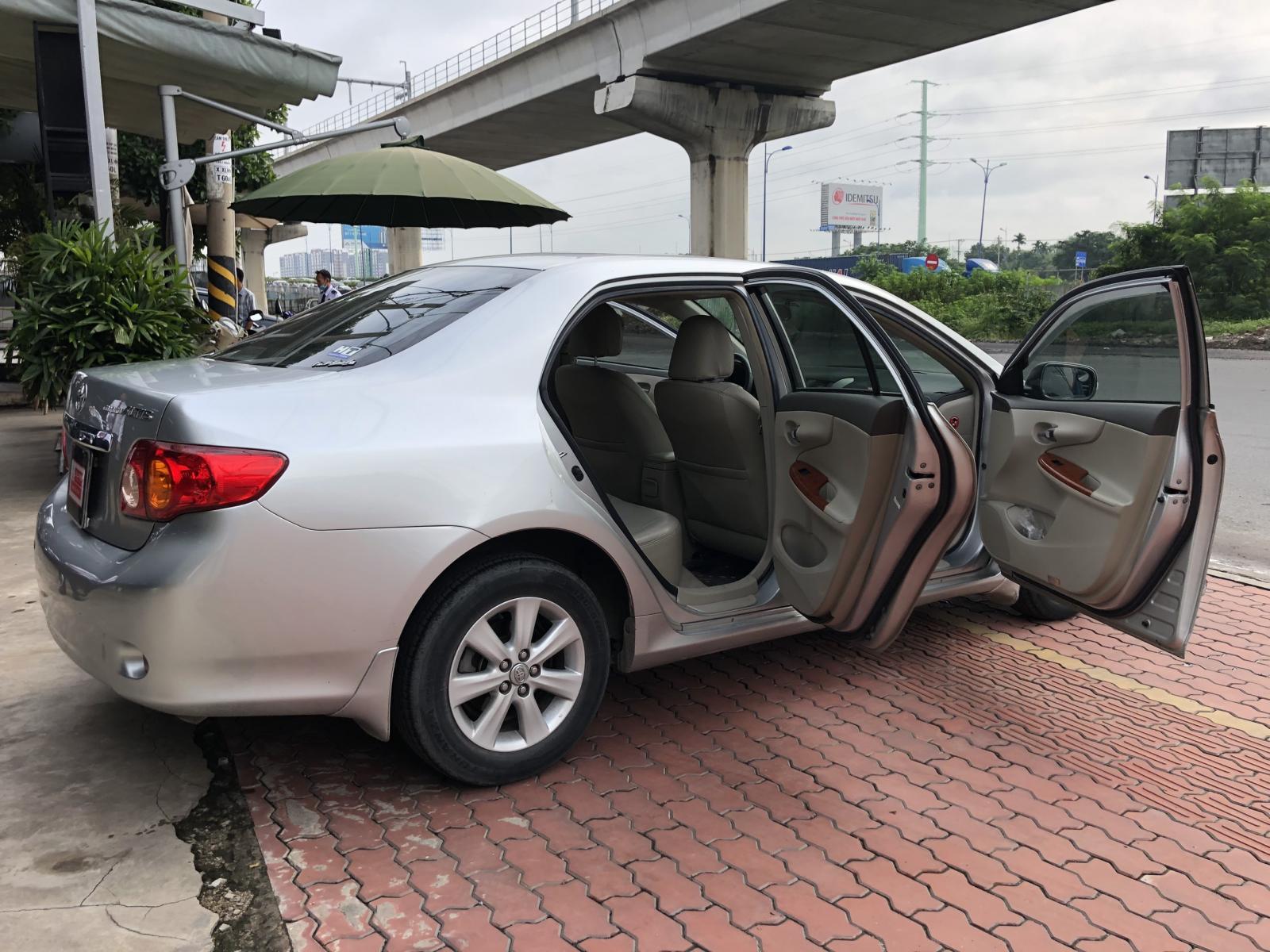 Toyota Corolla altis 1.8G 2009 - Bán ô tô Toyota Corolla altis 1.8G đời 2009, màu bạc