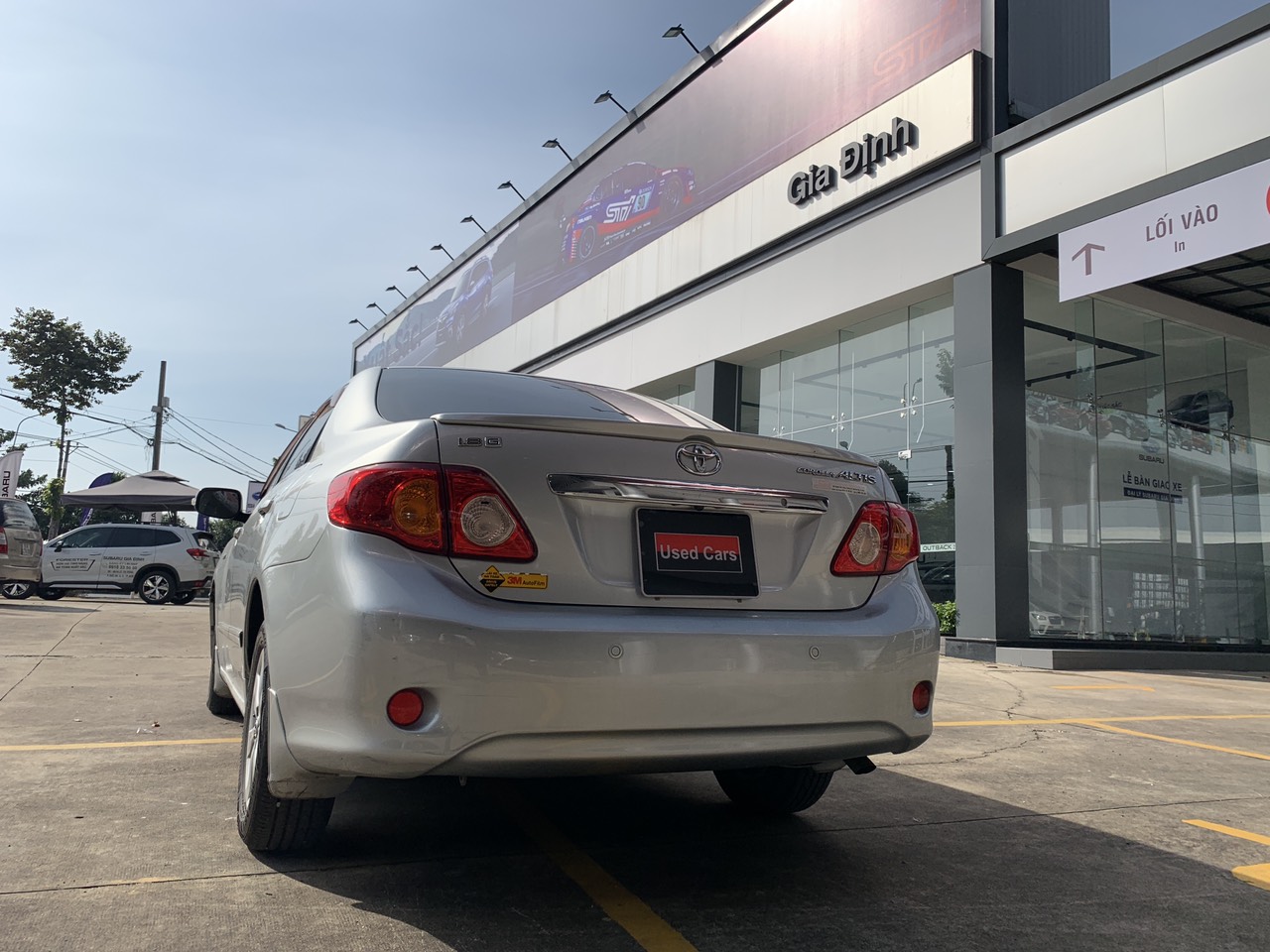 Toyota Corolla altis 1.8G 2010 - Bán Toyota Corolla altis 1.8G đời 2010, màu bạc giá thương lượng