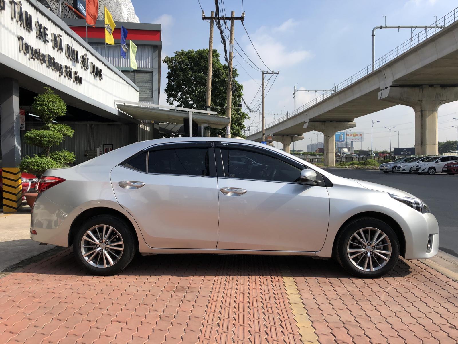 Toyota Corolla altis 1.8G CVT 2016 - Bán ô tô Toyota Corolla altis 1.8G CVT 2016 biển SG chạy mới 32.000km giá cực tốt