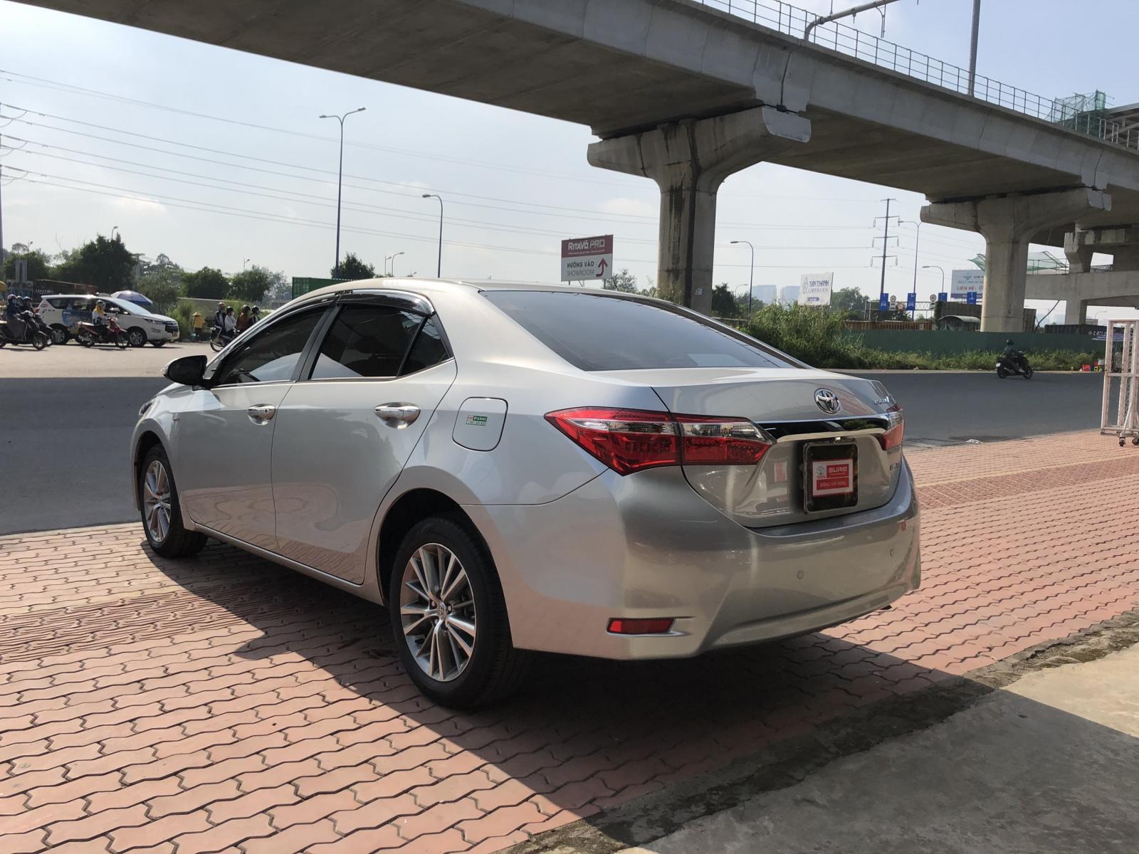 Toyota Corolla altis 1.8G CVT 2016 - Bán ô tô Toyota Corolla altis 1.8G CVT 2016 biển SG chạy mới 32.000km giá cực tốt