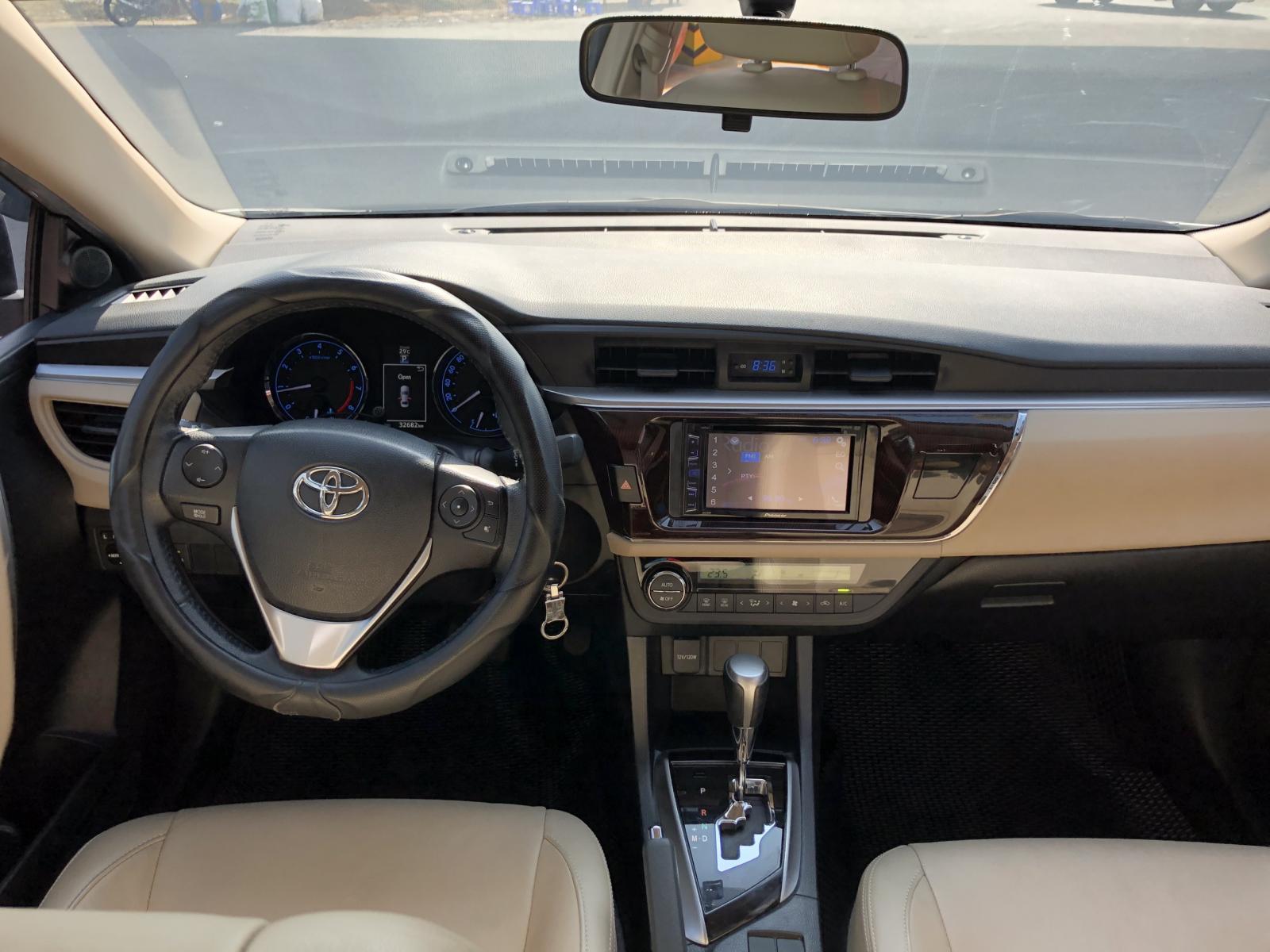 Toyota Corolla altis 1.8G CVT 2016 - Bán ô tô Toyota Corolla altis 1.8G CVT 2016 biển SG chạy mới 32.000km giá cực tốt