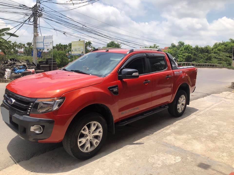 Ford Ranger 2013 - Bán Ford Ranger wildtrak 2013 tự động máy dầu màu đỏ đẹp