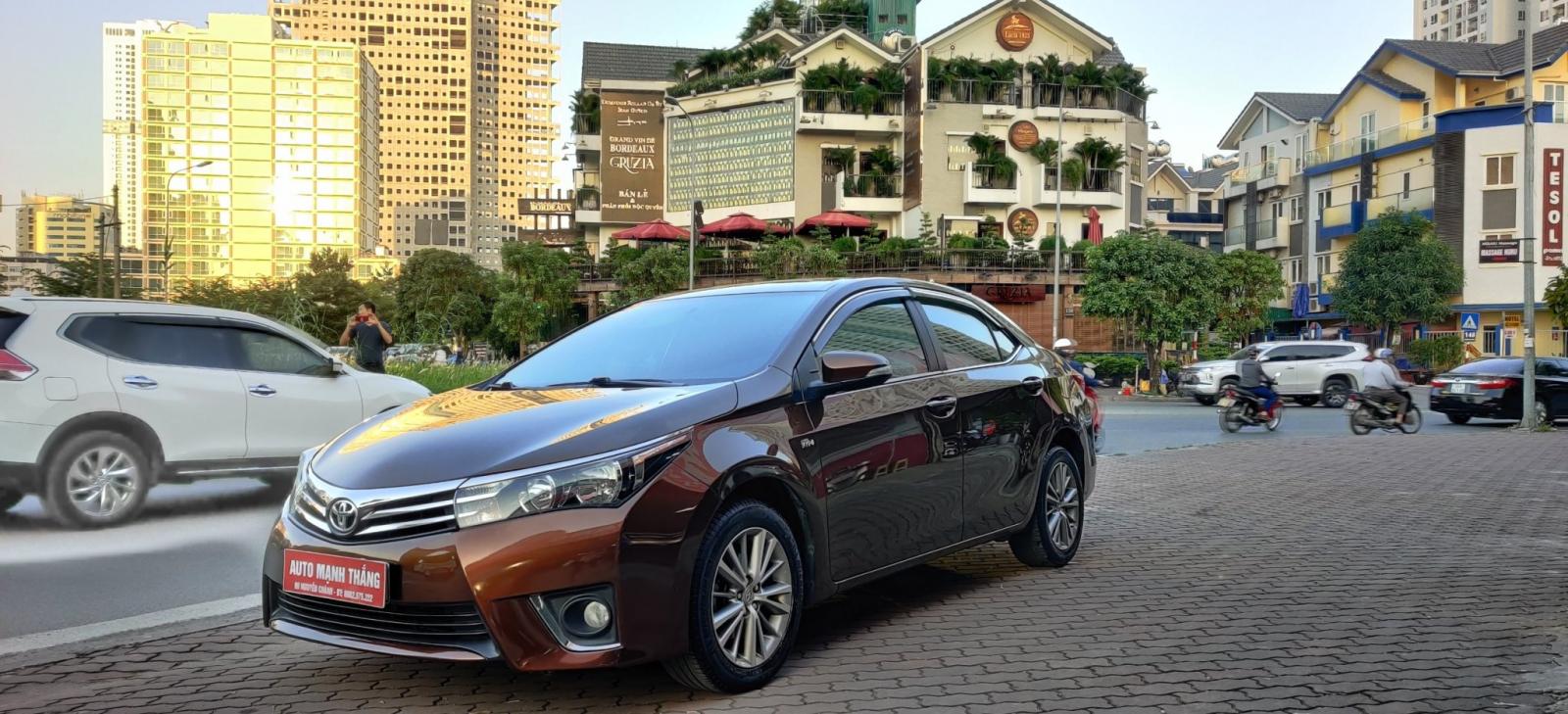 Toyota Corolla altis 1.8G AT 2015 - Cần bán xe Toyota Corolla altis 1.8G AT năm 2015, màu nâu