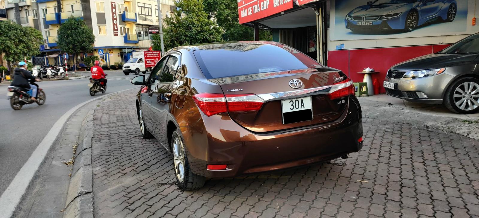 Toyota Corolla altis 1.8G AT 2015 - Cần bán xe Toyota Corolla altis 1.8G AT năm 2015, màu nâu