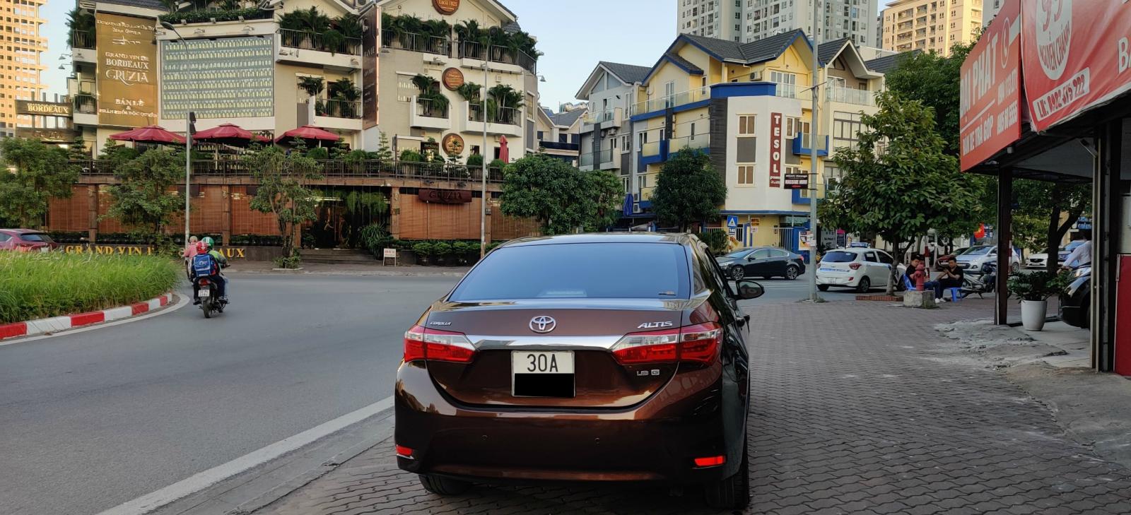 Toyota Corolla altis 1.8G AT 2015 - Cần bán xe Toyota Corolla altis 1.8G AT năm 2015, màu nâu