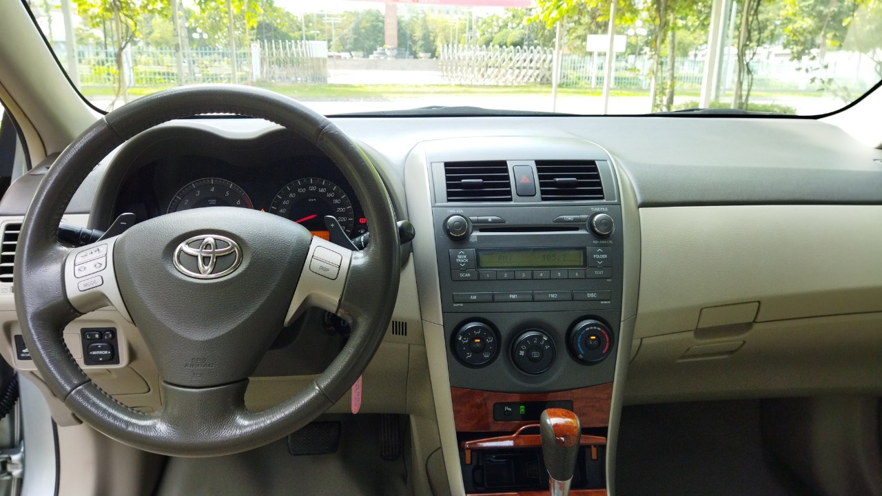 Toyota Corolla altis 2010 - Cần bán lại xe Toyota Corolla altis 2.0V đời 2010, màu bạc, biển SG 4 số - chuẩn chỉ 144.000km