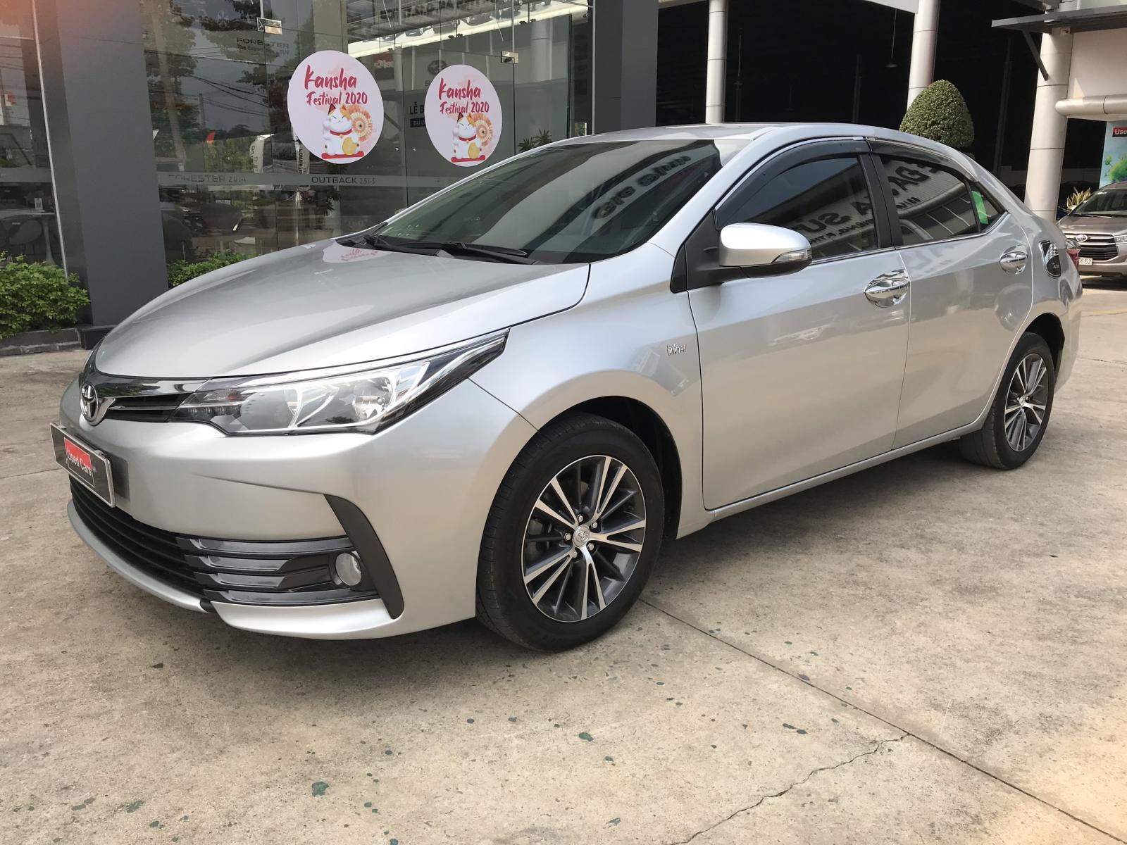 Toyota Corolla altis 1.8G 2018 - Bán xe Toyota Corolla Altis 1.8G đời 2018, màu bạc chuẩn chỉ 69.000km - giá cực tốt