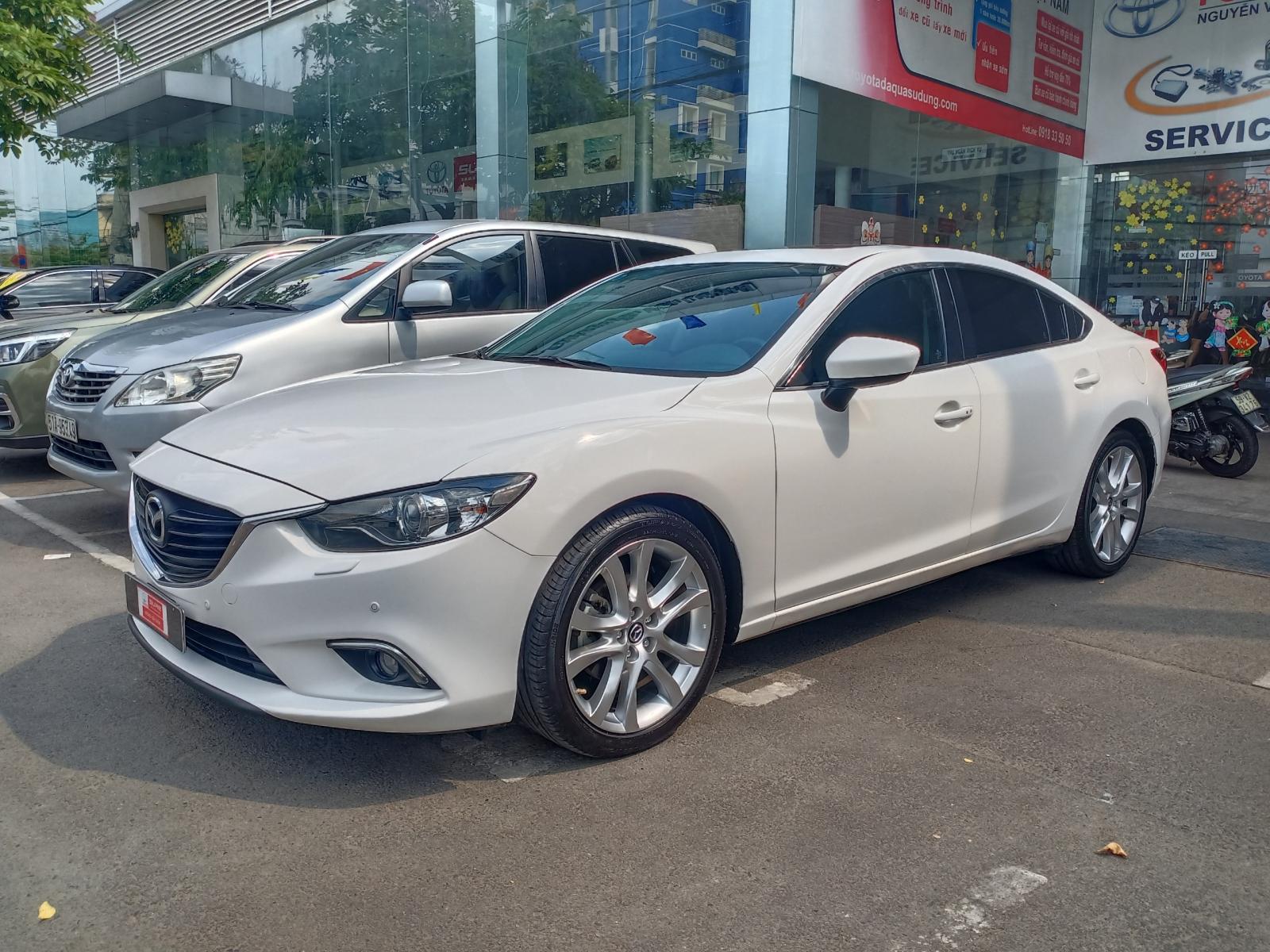 Mazda 6 2015 - Xe Mazda 6 2015, màu trắng, biển SG mới chạy 67.000km, giá chỉ 640 triệu