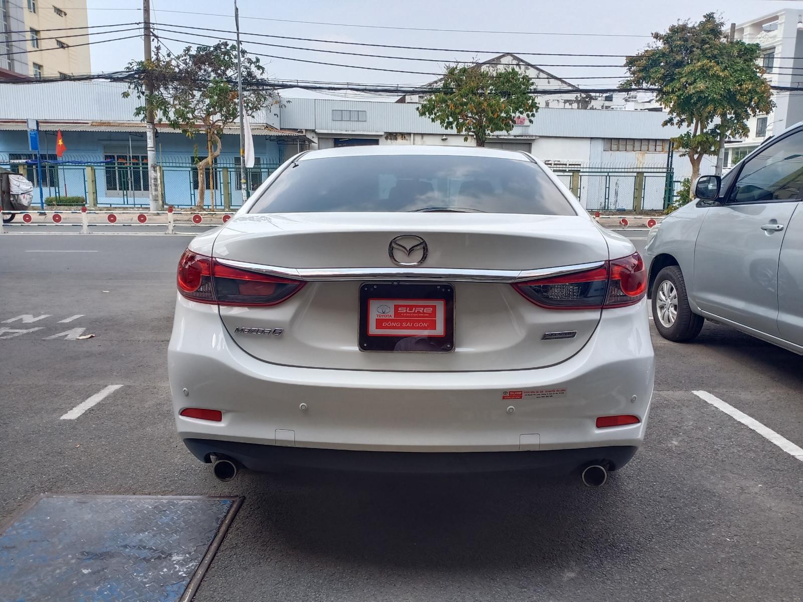 Mazda 6 2015 - Xe Mazda 6 2015, màu trắng, biển SG mới chạy 67.000km, giá chỉ 640 triệu