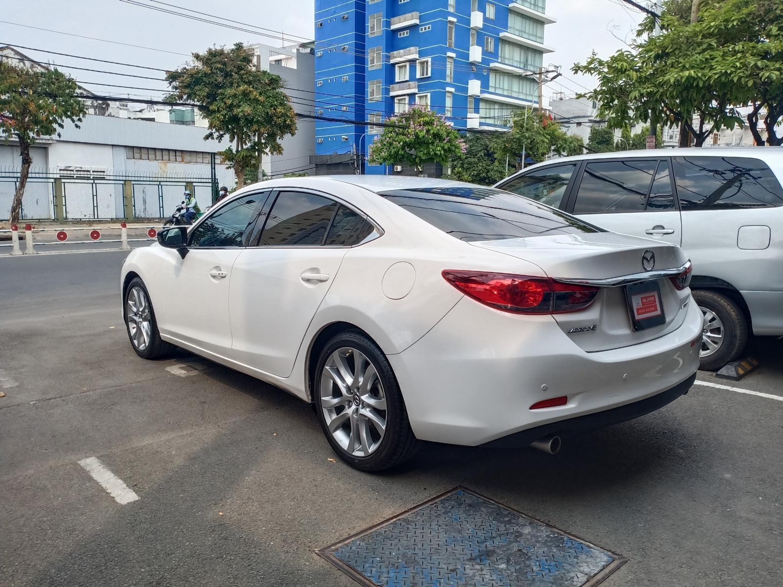 Mazda 6 2015 - Xe Mazda 6 2015, màu trắng, biển SG mới chạy 67.000km, giá chỉ 640 triệu