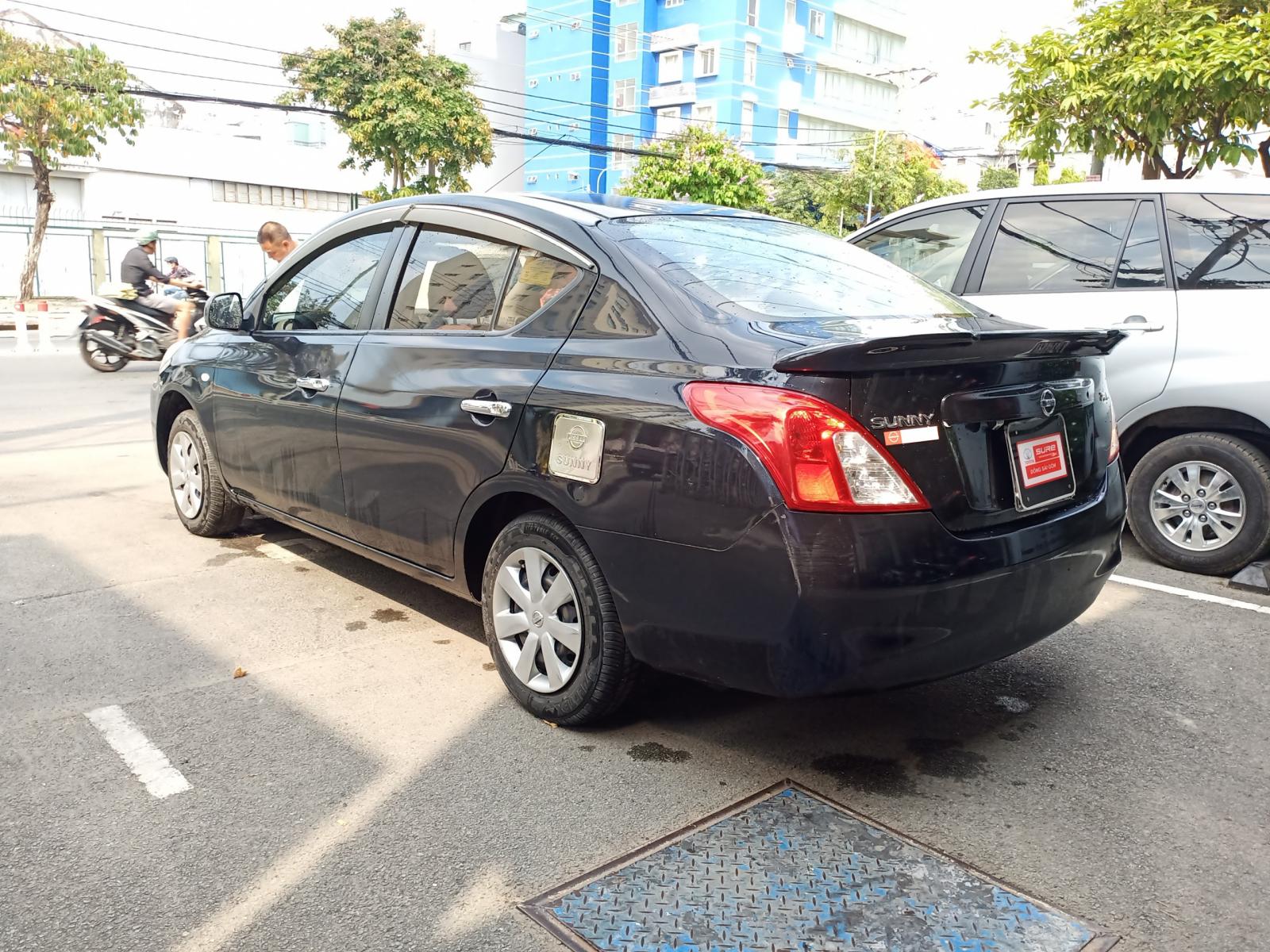 Nissan Sunny 1.5L XL 2015 - Cần bán xe Nissan Sunny 1.5L XL năm 2015, màu đen biển SG, mới chạy 115.000km - giá cực mềm