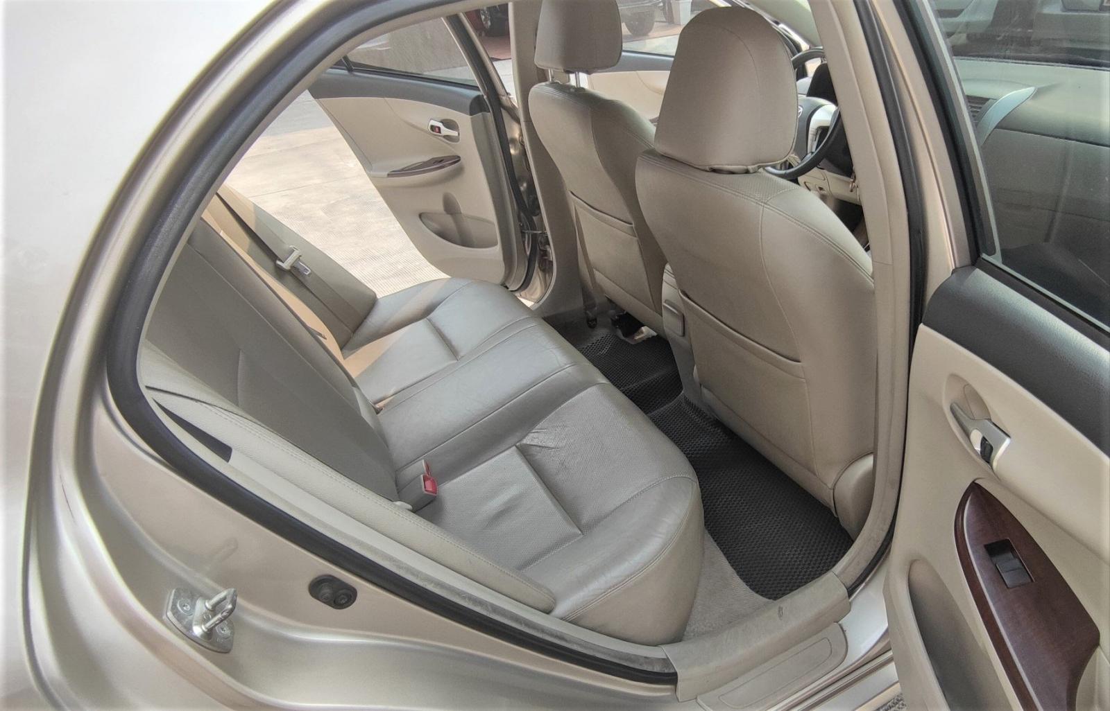 Toyota Corolla altis 1.8G 2014 - Cần bán xe Toyota Corolla Altis 1.8G sản xuất 2014, màu nâu vàng
